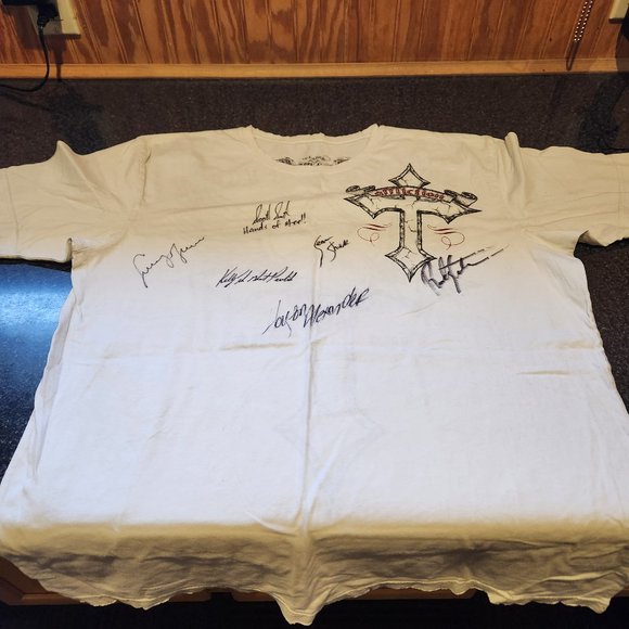 Brand new affliction shirt with fighters signatures